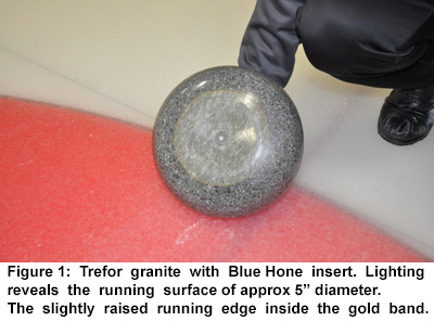 Figure 1.This is Trefor granite with a Blue Hone insert.The lighting reveals the running surface which is approximately 5 inch in diameter.You can see the slightly raised running edge just inside the gold band.